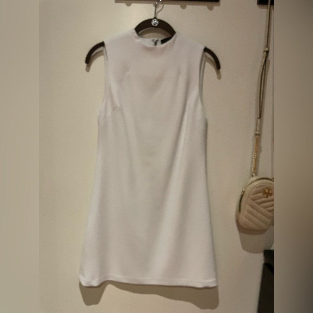 Alice and Olivia beautiful white mini dress in size 0.
